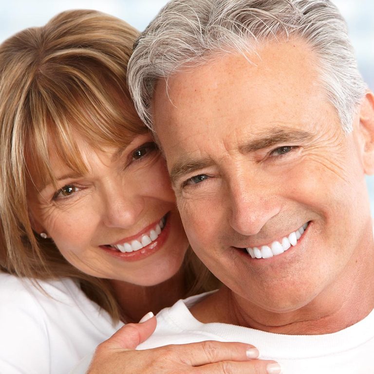 Comparing a dental implant with a bridge and a denture for replacing a missing tooth