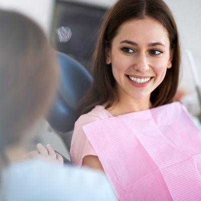 Dentist and patient in dentist office